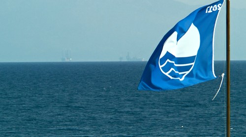 kalamitsa-blue-flagged-beach-and-energeans-platforms-prinos-na-greece.jpg
